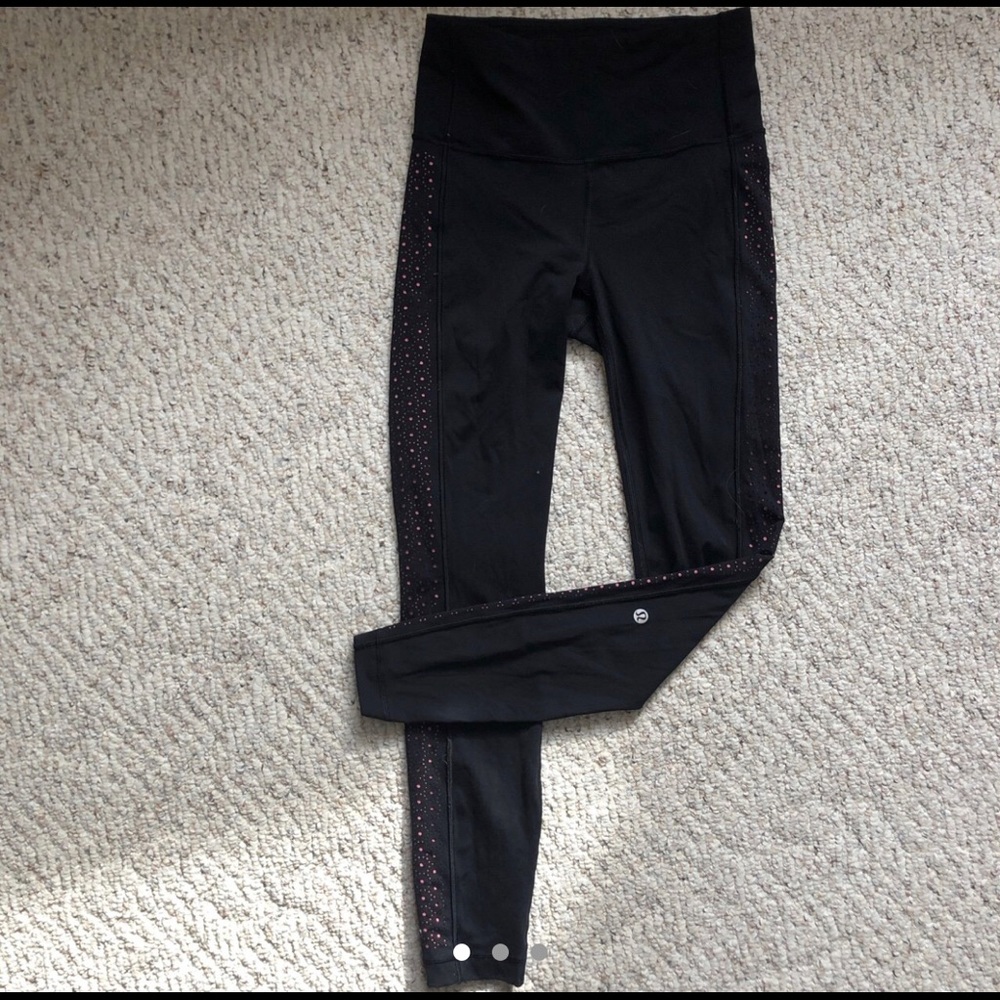 Black Lululemon leggings with mesh detailing